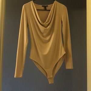 Nude bodysuit with low cut